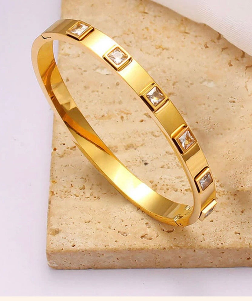 Anti Tarnish White
Square American Diamond studded Bangle-Style Bracelet