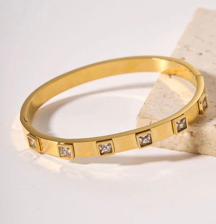 Anti Tarnish White
Square American Diamond studded Bangle-Style Bracelet
