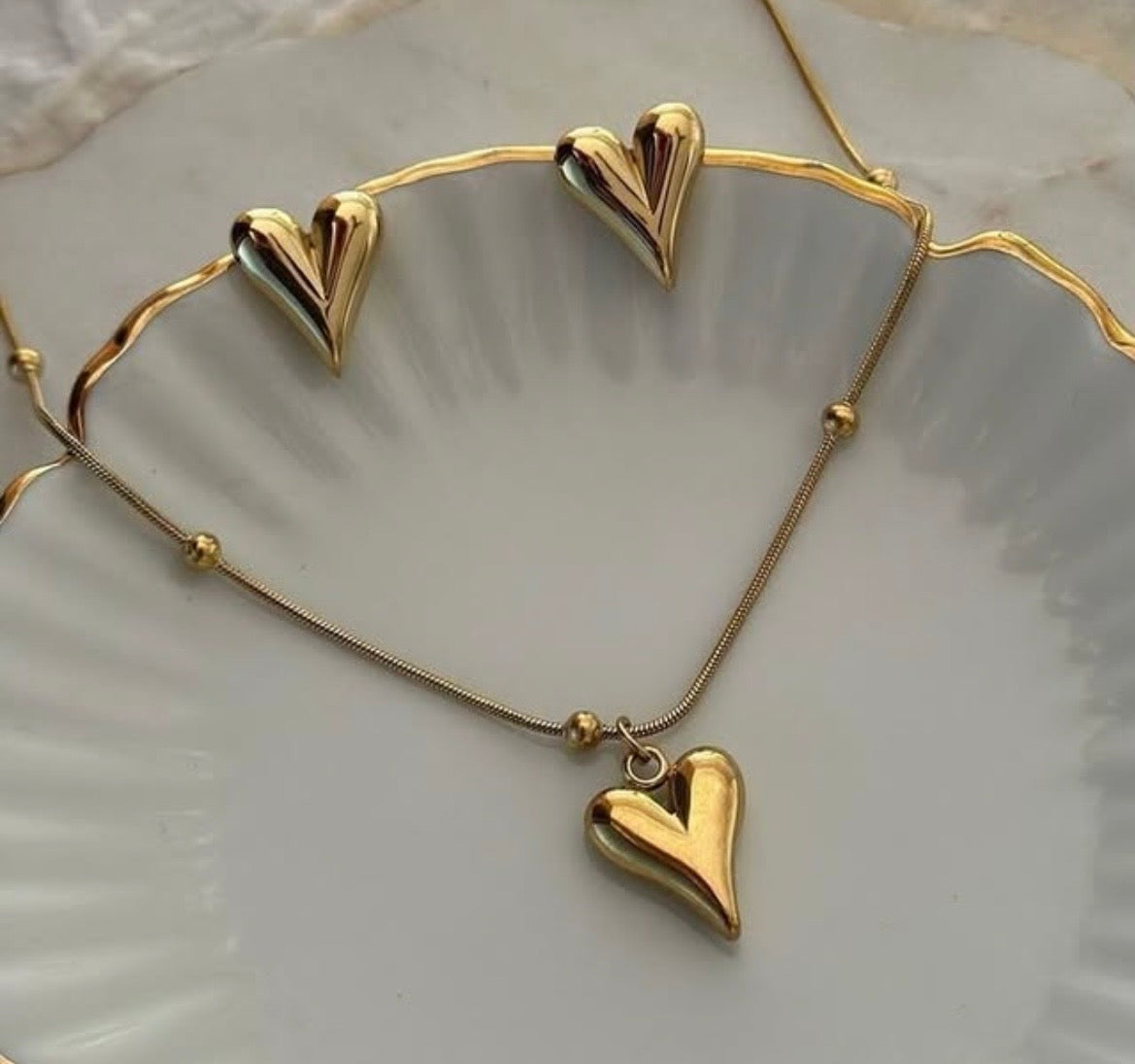 Heart themed necklace earring set