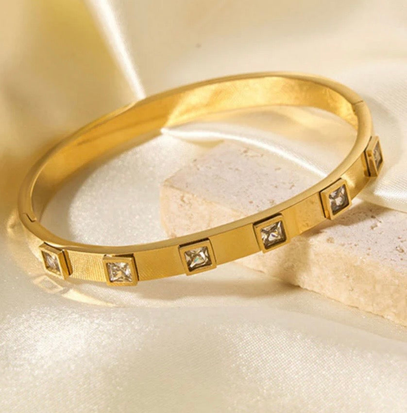 Anti Tarnish White
Square American Diamond studded Bangle-Style Bracelet